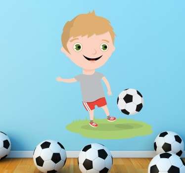 Adesivo bambino gioca a calcio