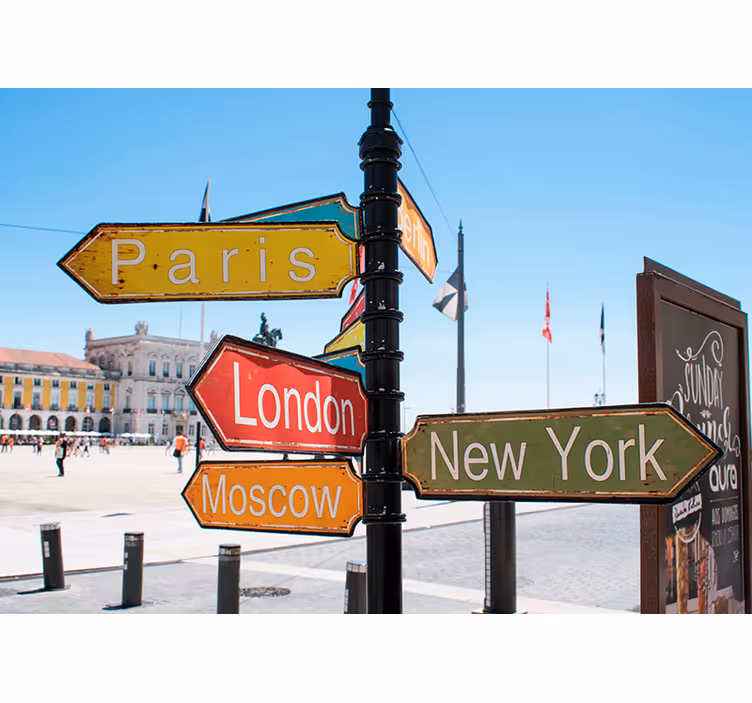 Fotomurali città e paesi cartello di direzione di viaggio - TenStickers