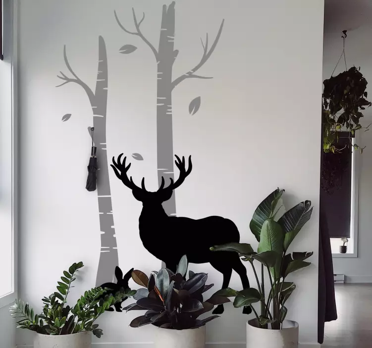 Adesivo gruccia cervi vicino agli alberi - TenStickers
