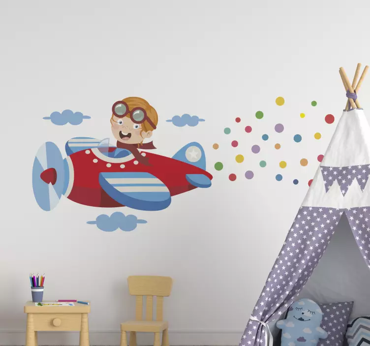 Adesivo murale bambini bambino che vola in aereo - TenStickers