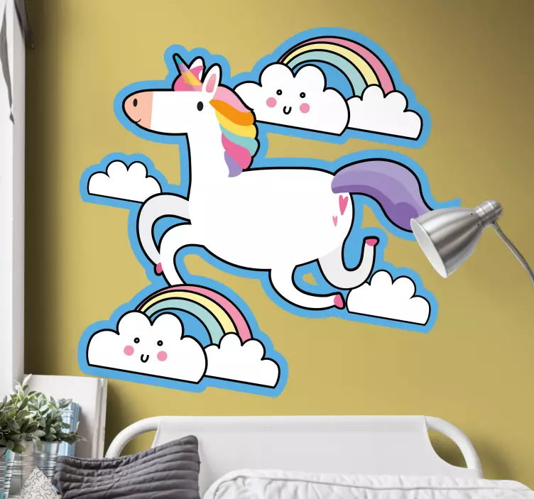 Adesivo murale bambini unicorno che corre tra le nuvole - TenStickers