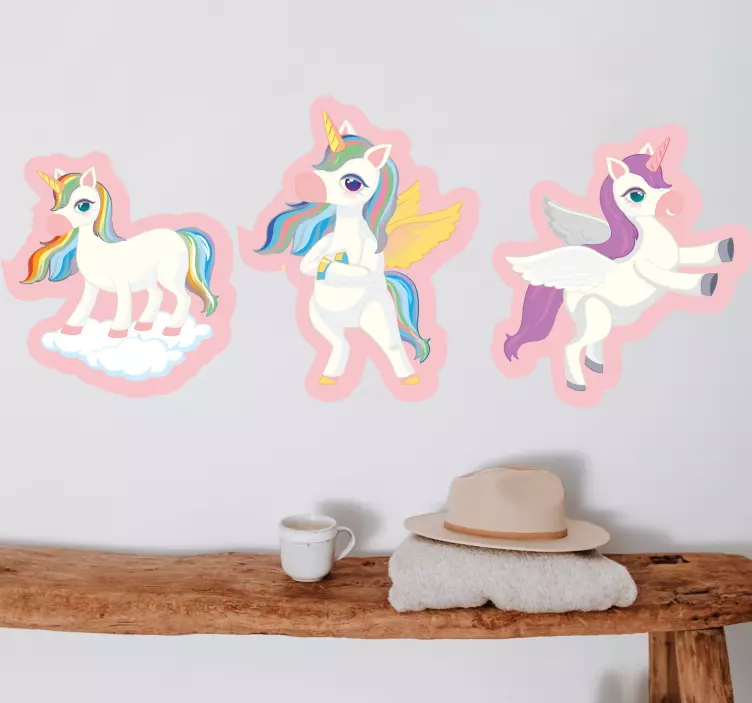 Adesivo murale bambini trio di unicorni giocosi - TenStickers