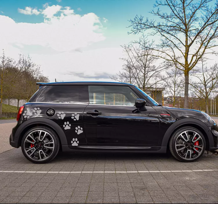 Adesivo per auto con impronte di cane - TenStickers