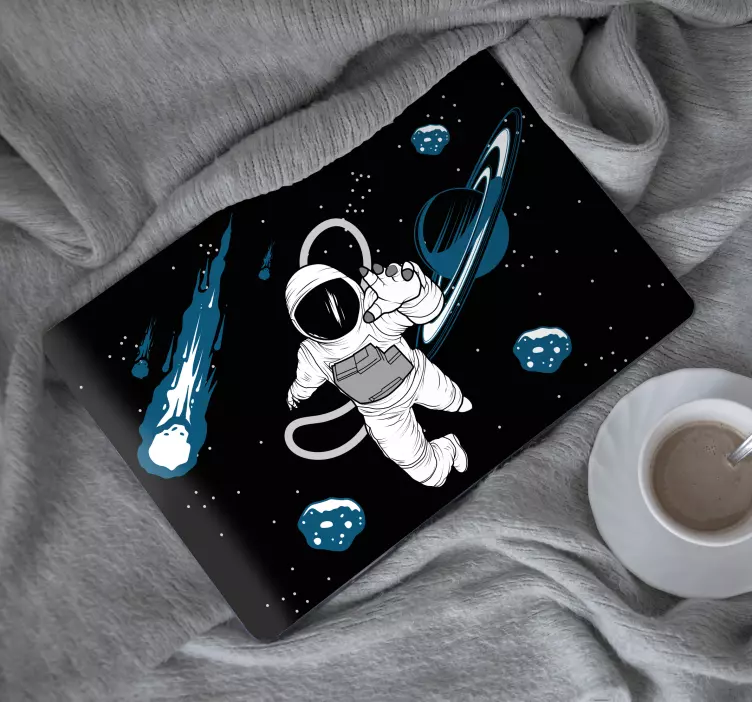 Adesivo per laptop astronauta nel cosmo fluttuante - TenStickers