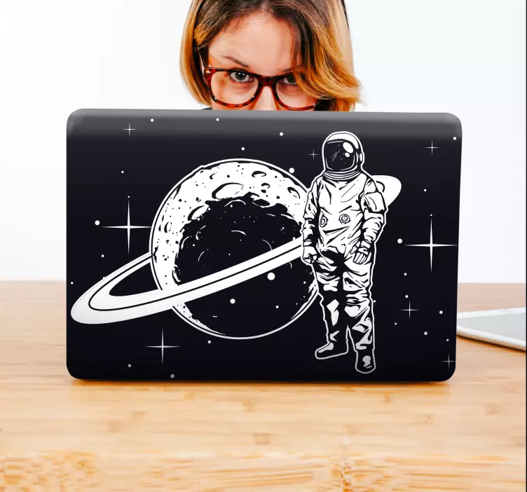 Adesivo per laptop astronauta e pianeta - TenStickers