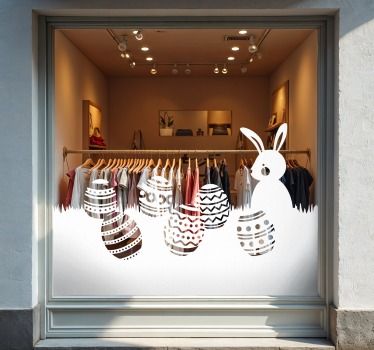 Adesivo per vetrine coniglio e uova di pasqua nel prato - TenStickers